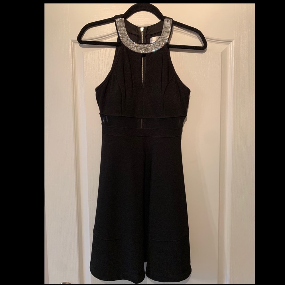 Black cocktail dress with rhinestone neck accents